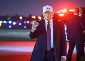 President Donald Trump pumps his fist at Palm Beach International Airport in West Palm Beach, Florida, on Feb. 27, 2026.