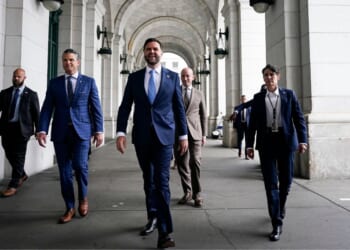 War Secretary Pete Hegseth, Vice President J.D. Vance, and White House Deputy Chief of Staff Stephen Miller arrive to meet with members of the National Guard during a visit to Union Station on Aug. 20, 2025, in Washington, D.C.