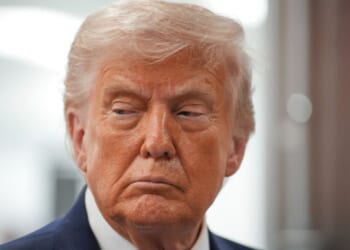 President Donald Trump attends a tour of a scientific facility in Reading, Ohio, on March 11, 2026.