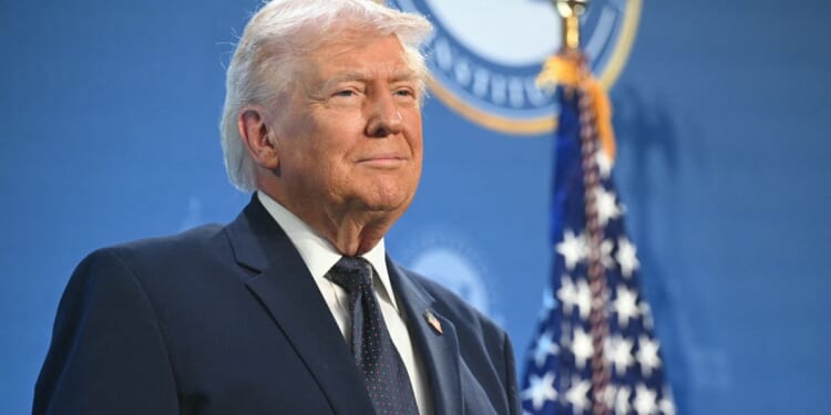 President Donald Trump acknowledges the applause of attendees to the Republican Members Issues Conference at Trump National Doral in Miami, Florida, on March 9, 2026.