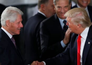 President Donald Trump greets former President Bill Clinton at the Inaugural Luncheon in the U.S. Capitol on Jan. 20, 2017, in Washington, D.C.