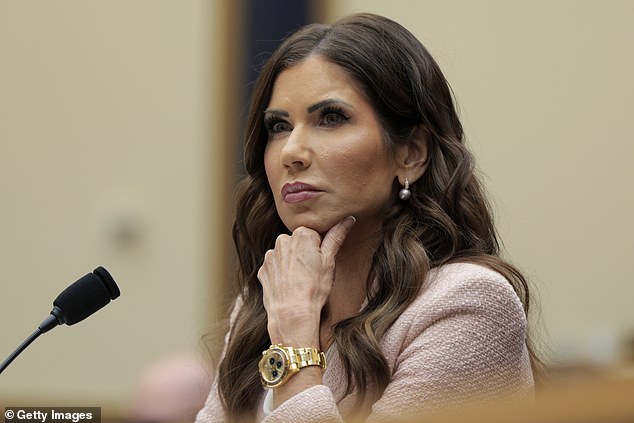 The Homeland Security Secretary wore a gold watch and a $700 Veronica Beard double-breasted tweed blazer