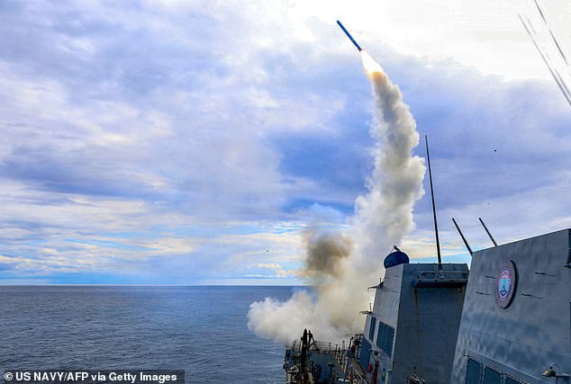 US Navy handout photo shows guided-missile destroyer USS Thomas Hudner (DDG 116) firing a Tomahawk land attack missile in support of Operation Epic Fury on March 1, 2026