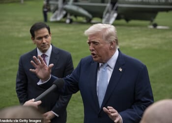 Trump is seen here at the White House on Friday afternoon. He wrote online that he is close to considering ending the war in Iran