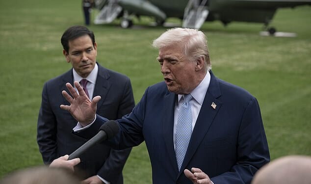 Trump is seen here at the White House on Friday afternoon. He wrote online that he is close to considering ending the war in Iran