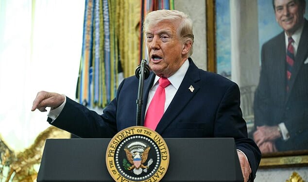 Donald Trump speaks to reporters in the Oval Office on Tuesday