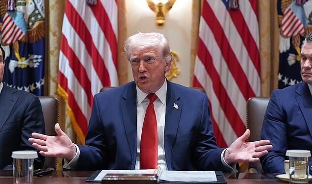 President Donald Trump speaks during a Cabinet meeting at the White House, Thursday, March 26, 2026, in Washington. He described Britain's aircraft carriers as 'toys' in his latest swipe at the UK