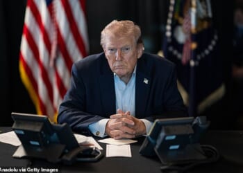 President Trump pictured while overseeing the US bombing campaign on Iran's Islamic Revolutionary Guard Corps