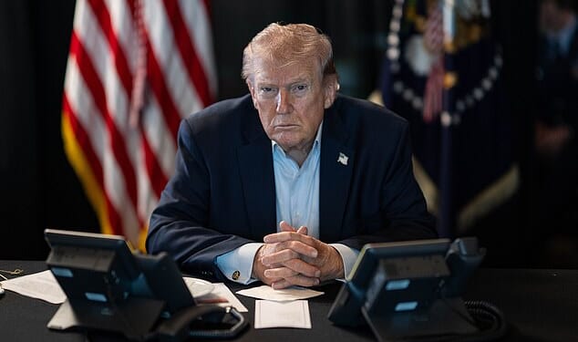 President Trump pictured while overseeing the US bombing campaign on Iran's Islamic Revolutionary Guard Corps