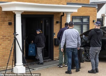 Counter-terrorism officers initially arrested four men with Iranian and dual British-Iranian citizenship but two have since been released without charge. Pictured: Police at the Watford property