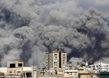 Smoke rises above Tehran on the second day of US-Israeli strikes on Iran
