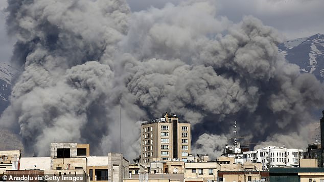 Smoke rises above Tehran on the second day of US-Israeli strikes on Iran