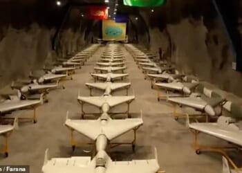 British intelligence officers are working with French and American counterparts inside the Iran to locate sites which have been identified by Israel as potential hiding places for nerve agents. Pictured: Iranian drones in an underground depot