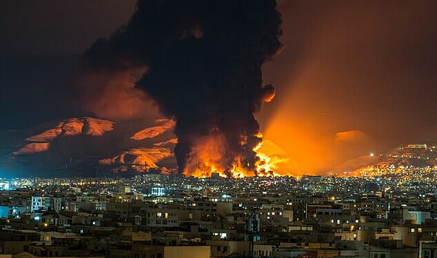 US State Department issued a warning to Americans worldwide to be cautious over concerns that groups supportive of Iran may target interests overseas (Pictured, flames rising from an oil depot struck by airstrikes in Tehran on March 7, 2026)