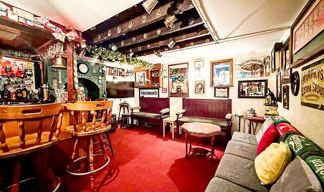 The basement is fully decked out like a pub with a fully stocked bar