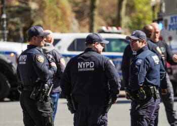 New York Police Department counterterrorism officers respond to a suspicious package report in Carl Schurz Park, which borders Gracie Mansion, on March 10, 2026, in New York City.
