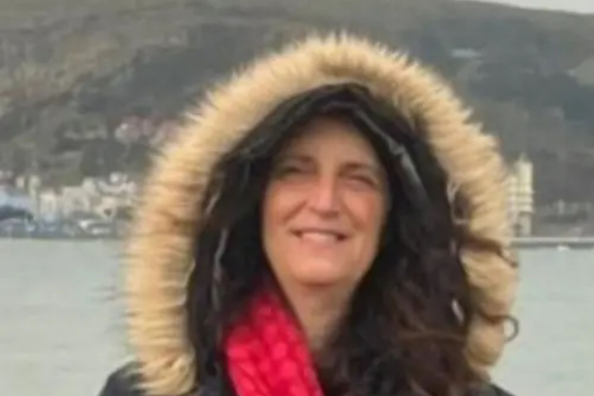 An image collage containing 1 images, Image 1 shows Eleanor from Staffordshire Police, smiling and wearing a black winter coat and red scarf by a body of water