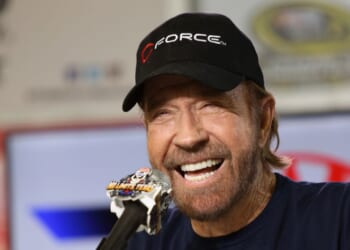 Chuck Norris speaks with the media during a press conference prior to the NASCAR Sprint Cup Series AAA Texas 500 at Texas Motor Speedway on Nov. 6, 2016, in Fort Worth, Texas.