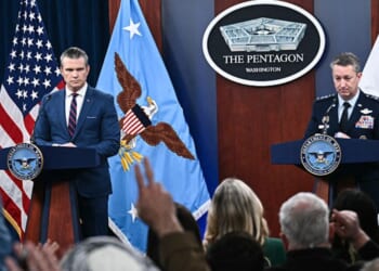 Secretary of War Pete Hegseth, left, and the Chairman of the Joint Chiefs of Staff General Dan Caine, right, take questions during a news conference Monday on U.S. military action in Iran, at the Pentagon in Washington, D.C.