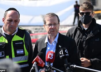 Israel's president Isaac Herzog (centre) said the conflict in Iran could reshape the Middle East for generations in an exclusive interview with the Daily Mail