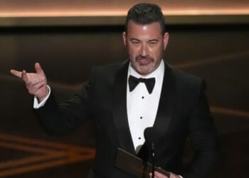 Jimmy Kimmel presents the award for best documentary short film Sunday during the Oscars in Los Angeles.