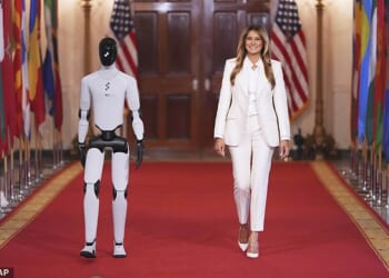 First Lady Melania Trump (right) made a grand entrance at her Fostering the Future Together White House event Wednesday, alongside Figure 3 (left), a humanoid robot made in the United States