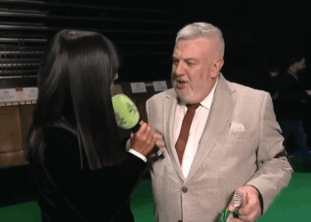 Watch the awkward moment Crufts winner accidentally hits Claudia Winkleman in the face with a microphone