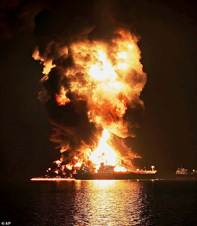 An oil tanker burns after being hit by an Iranian strike in the ship-to-ship transfer zone at Khor al-Zubair port near Basra, Iraq