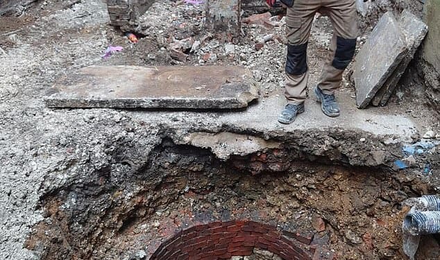 Builders renovating a shop in Caistor, Lincolnshire, discovered a Roman well (pictured) dating back 2,000 years in its courtyard
