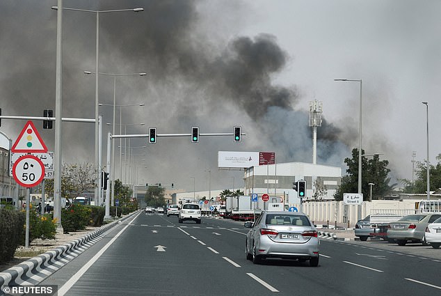 The U.S. and Israel struck Iran on Sunday, leaving plumes of smoke as seen from Doha, Qatar