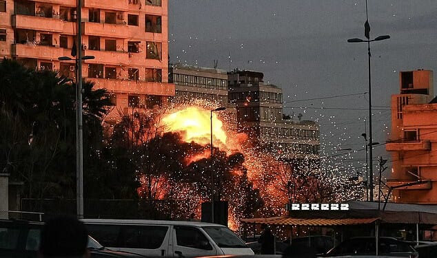 A fireball rises from the site of an Israeli airstrike that targeted a building in Beirut's Bashoura neighbourhood