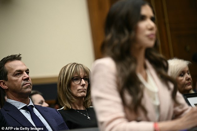 Noem married her husband in 1992 after they met as high school students, and they share three children together. Bryon is pictured showing support for his wife as she is grilled by lawmakers on Wednesday, March 4