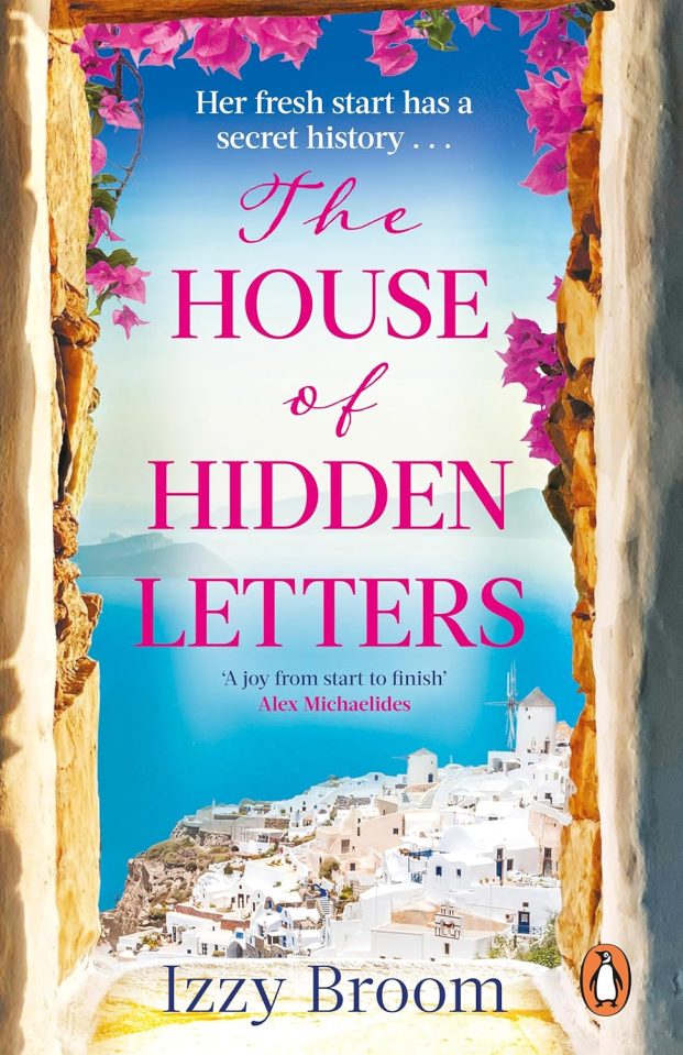 Book cover for "The House of Hidden Letters" by Izzy Broom, showing a view through a stone archway with pink flowers over a white village on a cliff overlooking blue water.