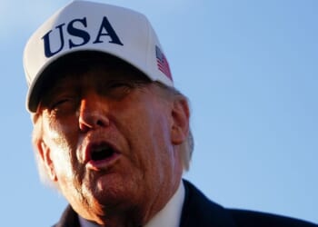 President Donald Trump speaks to the media before hopping on board Air Force One on March 13, 2026 at Joint Base Andrews, Maryland.