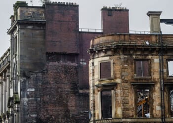 Workers were lifted more than 150ft into the air as they began demolition works