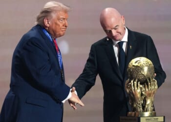 FIFA President Gianni Infantino presents President Donald Trump with the FIFA Peace Prize Dec. 5 during the draw for the 2026 soccer World Cup in Washington, D.C.