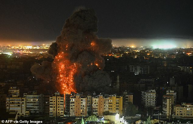 A fireball rising from the site of an Israeli air strike overnight in Beirut on March 11