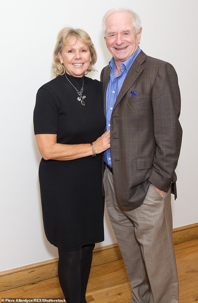 Speaking to The Mirror, he said: 'I’ve been kicked in the teeth in every possible way by life and by situations and by people. But I still cannot help but smile. I have my wife, my dog, my life' (pictured with wife Dianne in 2012)