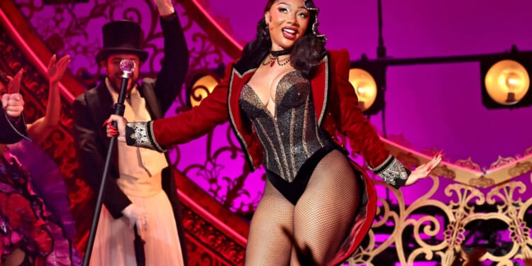 Megan Thee Stallion rushed to hospital mid-performance after falling 'very ill' while starring in Moulin Rouge