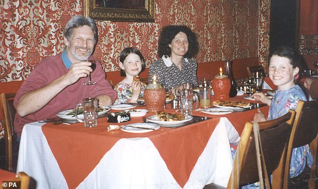 Pictured: Lin Russell with her husband Shaun and their two children Megan (left) and Josie at an Italian restaurant in 1996