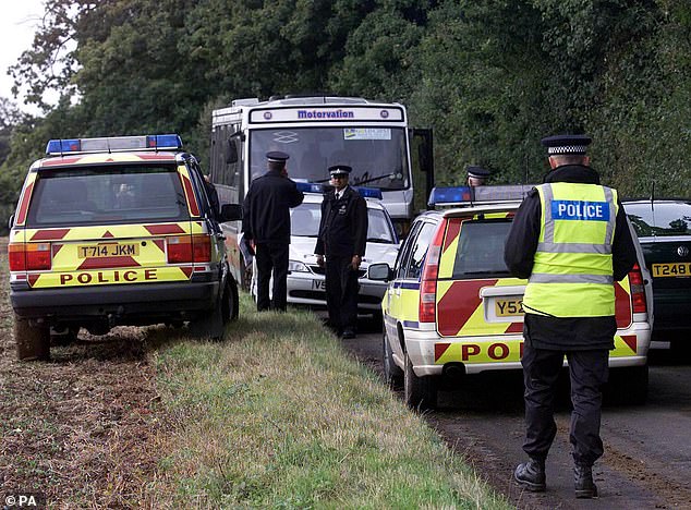 Pictured: Police at the scene of Lin and Megan Russell's murder in Chillenden, Kent, 1996