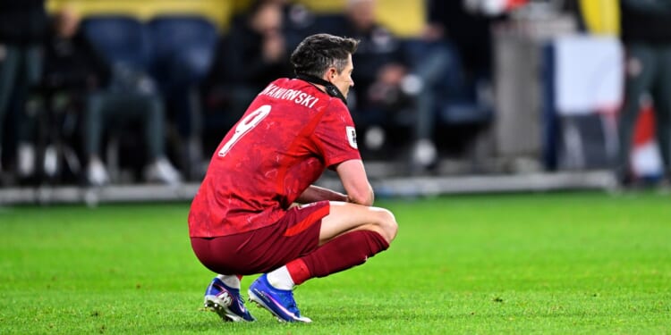 Robert Lewandowski fights back tears as Poland legend, 37, has World Cup dream shattered by Arsenal's Viktor Gyokeres