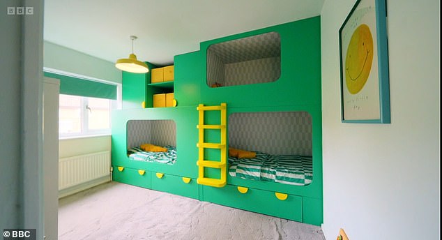 The boys' bedroom now includes a trio of single beds positioned within bright green sleeping pods, which are built in