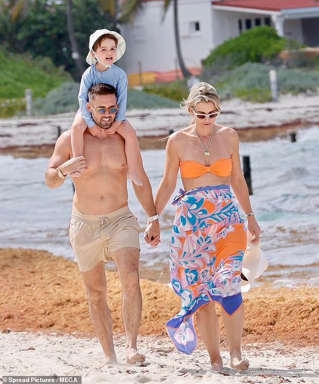 The family have jetted off for a spring break on the Caribbean island, putting behind them Britain's relentlessly cold weather while they bask in twenty-six degree temperatures