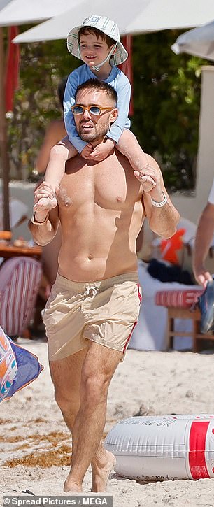 The TV personality shielded his eyes behind a pair of heavily tinted sunglasses