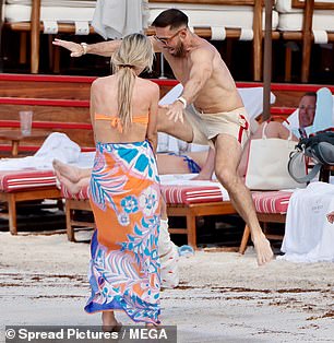 Vogue spun her young daughter Gigi in circles while Spencer leapt over her spinning feet