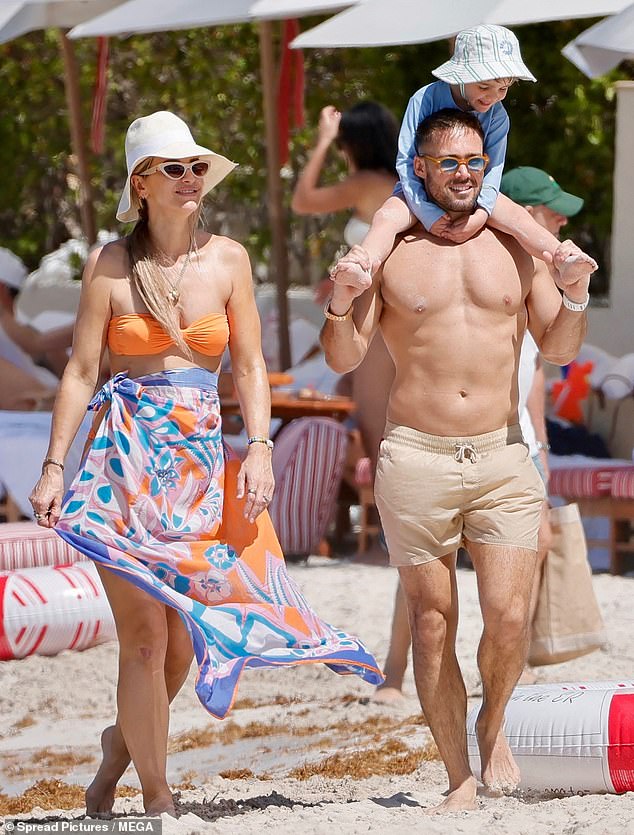 The family appeared to be making the most of their current stay on the popular Caribbean island