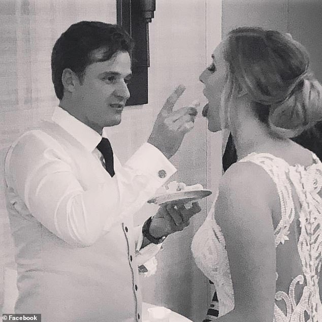 Konig feeds Arielle cake on their wedding day in 2018