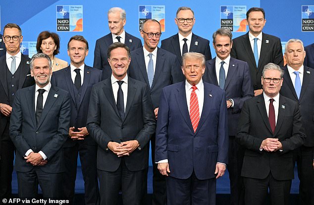 Finland's President Alexander Stubb, Netherlands' Prime Minister Dick Schoof, France's President Emmanuel Macron, NATO Secretary General Mark Rutte, US President Donald Trump, Greece's Prime Minister Kyriakos Mitsotakis, Britain's Prime Minister Keir Starmer, Hungary's Prime Minister Viktor Orban stand with NATO country leaders for a family photo during the North Atlantic Treaty Organization