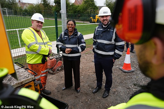 Conservative Party leader Kemi Badenoch (centre), and shadow transport secretary Richard Holden (right) are pictured
